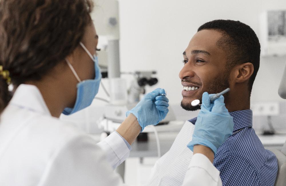 man getting dental exam with dentist | cosmetic dentist parramatta