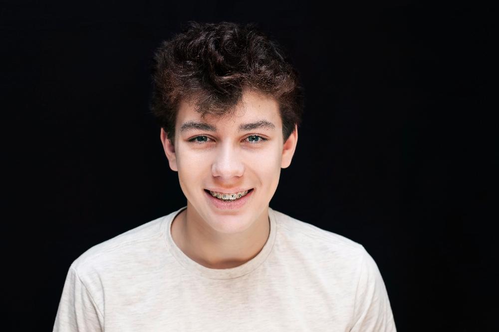 boy wearing traditional braces | orthodontics parramatta