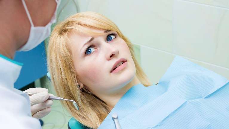 woman scared at the dentist in parramatta