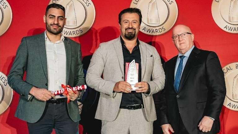 dr elie alam holding award | dentist parramatta