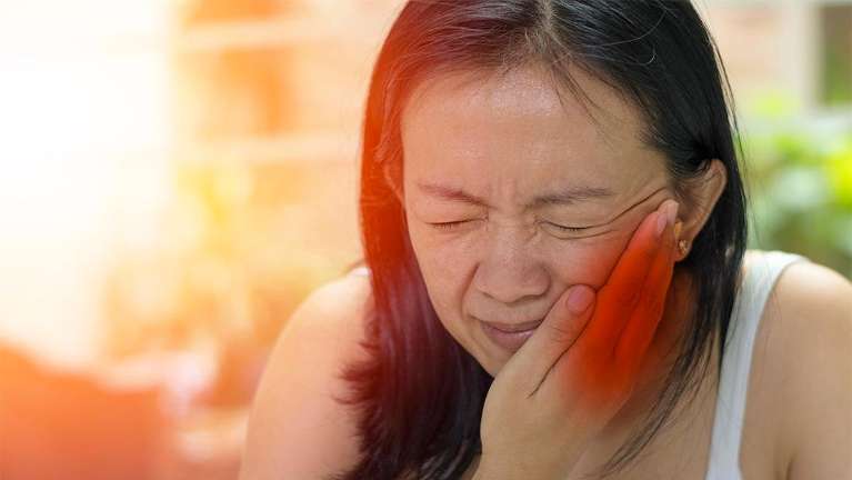 woman with tooth pain parramatta