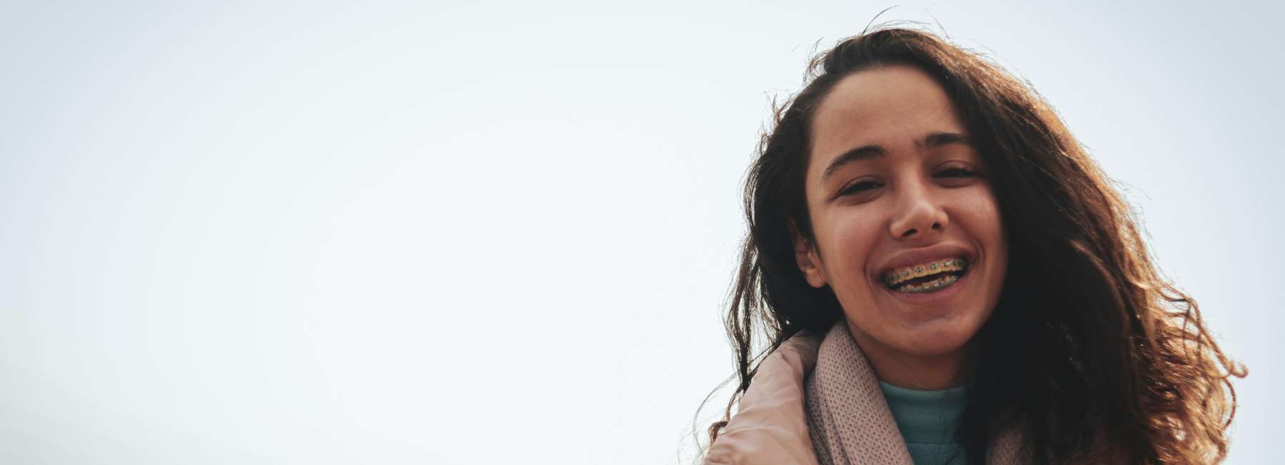 teenager smiling with orthodontics in parramatta