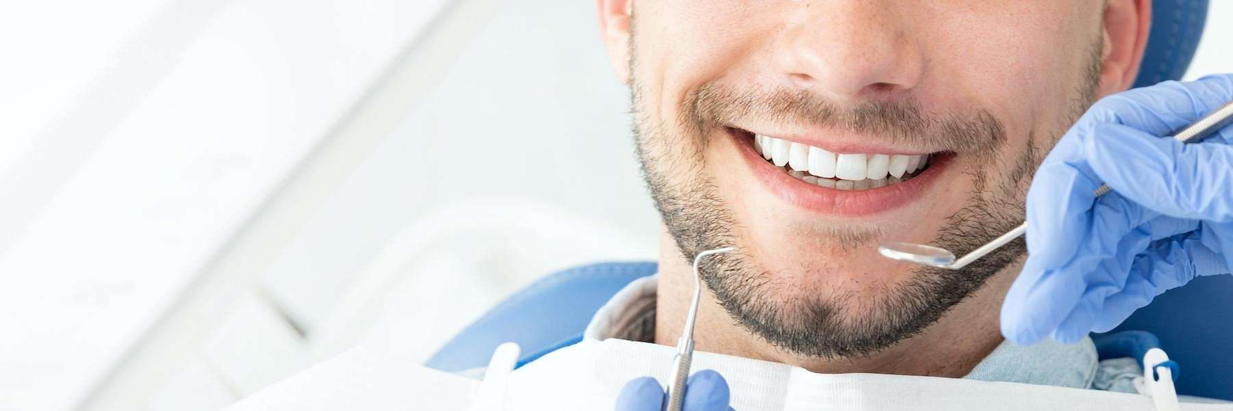 man receiving dentist exam | parramatta dentist