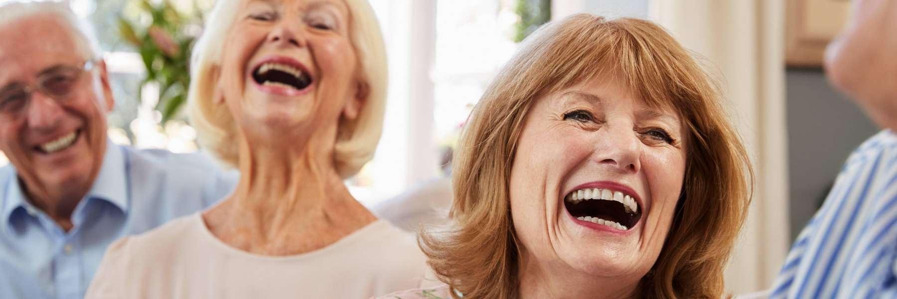 woman with dental implants laughing in parramatta